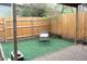View of grass in fenced-in backyard area at 3073 W Center Ave # C, Denver, CO 80219