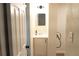 Modern bathroom with sleek vanity, mirror, and contemporary lighting at 3073 W Center Ave # C, Denver, CO 80219