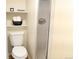 Cozy bathroom featuring a toilet, shelving, and enclosed shower at 3073 W Center Ave # C, Denver, CO 80219