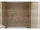 Tiled bathtub shower with contemporary fixtures at 3073 W Center Ave # C, Denver, CO 80219