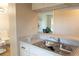 Kitchen sink with modern faucet and view of the living room at 3073 W Center Ave # C, Denver, CO 80219