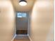 Bright stairway with laminate floors leading to basement at 3073 W Center Ave # C, Denver, CO 80219