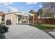 Beautiful backyard featuring a pergola, patio, artificial turf, and professional landscaping at 1194 S Washington St, Denver, CO 80210