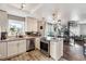 Stylish kitchen featuring granite countertops, stainless steel appliances, and a spiral staircase enhancing the open layout at 1194 S Washington St, Denver, CO 80210