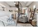 Bright living room with a spiral staircase, hardwood floors, stylish decor, and comfortable seating, great for entertaining at 1194 S Washington St, Denver, CO 80210