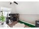 Cozy office with vaulted ceiling, ceiling fan, putting green, and dual monitors at 1194 S Washington St, Denver, CO 80210