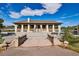 Picturesque pavilion overlooking a lake, complete with seating and manicured landscape at 1194 S Washington St, Denver, CO 80210
