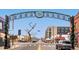 View of South Pearl Street with shops, restaurants, street sign, and commercial buildings at 1194 S Washington St, Denver, CO 80210