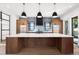 Sleek kitchen featuring a large island, stainless steel appliances, and stylish pendant lighting at 5358 Lions Paw St, Castle Rock, CO 80104