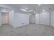 Spacious carpeted basement area with white walls, recessed lighting, and a closet for storage and organization at 11886 Elk Head Range Rd, Littleton, CO 80127
