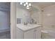 Bathroom with neutral tile and sink at 11886 Elk Head Range Rd, Littleton, CO 80127