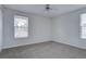 Bedroom with natural light from two windows at 11886 Elk Head Range Rd, Littleton, CO 80127