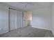 Bedroom with large closet and interior door at 11886 Elk Head Range Rd, Littleton, CO 80127