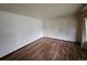 Spacious living room with hardwood flooring, offering a versatile and inviting space at 912 E 6Th Ave, Broomfield, CO 80020