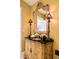 Elegant bathroom featuring ornate mirror and custom vanity at 2 Cherry Hills Farm Dr, Cherry Hills Village, CO 80113