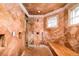 Spa-like shower with marble tile and built-in bench at 2 Cherry Hills Farm Dr, Cherry Hills Village, CO 80113