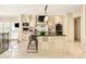 Gourmet kitchen with custom cabinetry and large island at 2 Cherry Hills Farm Dr, Cherry Hills Village, CO 80113