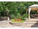 Landscaped patio with seating area under a pergola at 2 Cherry Hills Farm Dr, Cherry Hills Village, CO 80113