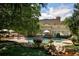 Luxury backyard oasis with a pool, spa, and patio at 2 Cherry Hills Farm Dr, Cherry Hills Village, CO 80113