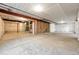 Unfinished basement with concrete flooring and exposed ducts awaiting customization at 5629 Farrier Pt, Castle Rock, CO 80104