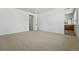 Bright bedroom with carpet, white walls, and adjoining bathroom at 5629 Farrier Pt, Castle Rock, CO 80104
