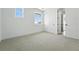 Bright bedroom featuring a plush carpet and sliding door closet at 5629 Farrier Pt, Castle Rock, CO 80104