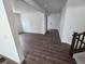 Bright, open-concept living space with hardwood floors and modern finishes, perfect for entertaining guests at 5629 Farrier Pt, Castle Rock, CO 80104