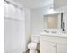 Clean bathroom with a shower/tub combo, white vanity, and bright lighting at 1011 Milo Cir # A, Lafayette, CO 80026