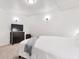 Basement bedroom with a TV, dresser and decor at 1011 Milo Cir # A, Lafayette, CO 80026