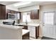 Efficient kitchen with stainless steel appliances, sleek countertops, and generous cabinet storage at 1011 Milo Cir # A, Lafayette, CO 80026