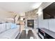 Stylish living area with a stone fireplace, modern furniture, and a cozy atmosphere at 1011 Milo Cir # A, Lafayette, CO 80026