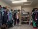 Large walk-in closet with shelving and hanging rods at 6051 S Telluride Cir, Aurora, CO 80016