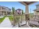 Comfortable front porch showcasing neighborhood views and stylish design elements at 17855 E 103Rd Ave, Commerce City, CO 80022