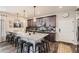 Well-equipped kitchen with a large island, modern appliances, and ample counter space at 17855 E 103Rd Ave, Commerce City, CO 80022