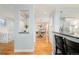 Elegant dining room with hardwood floors and chandelier at 1165 N Pennsylvania St # 1B, Denver, CO 80203