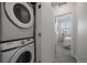 In-unit laundry with stackable Samsung washer and dryer at 1841 S Dunkirk St # 203, Aurora, CO 80017