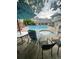 Relaxing community pool and spa area with lounge chairs and shade umbrellas at 1841 S Dunkirk St # 203, Aurora, CO 80017