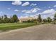Scenic view of the Denver Botanic Gardens with a long gravel path and lush green landscape at 2530 N Franklin St, Denver, CO 80205