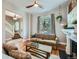 Comfortable living room with hardwood floors and large windows, offering a cozy atmosphere at 2530 N Franklin St, Denver, CO 80205