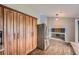 View of kitchen with a stainless-steel refrigerator and a connecting door to the living room at 18984 E Kent Cir, Aurora, CO 80013