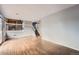 Spacious living room showcasing wood floors and staircase to second level at 18984 E Kent Cir, Aurora, CO 80013
