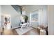 Bright home office with large window, modern desk, and wood floors at 6898 W Rockland Pl, Littleton, CO 80128
