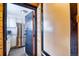 View into a modern kitchen with stainless steel appliances and granite countertops at 1100 Colorado Blvd # 305, Denver, CO 80206
