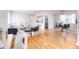 Spacious living room with hardwood floors, stylish furniture, and plenty of natural light at 1100 Colorado Blvd # 305, Denver, CO 80206