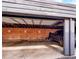 Assigned parking spot in garage of building with brick wall at 1100 Colorado Blvd # 305, Denver, CO 80206