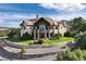 Luxury home with large backyard and stone wall at 4479 Tierra Alta Dr, Castle Rock, CO 80104