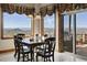 Breakfast nook with scenic views and access to outdoor patio at 4479 Tierra Alta Dr, Castle Rock, CO 80104