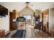 Home gym with wood floors, fireplace, and balcony access at 4479 Tierra Alta Dr, Castle Rock, CO 80104