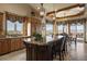 Gourmet kitchen with granite island, high-end appliances, and scenic views at 4479 Tierra Alta Dr, Castle Rock, CO 80104