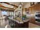 Gourmet kitchen with granite counters and double ovens at 4479 Tierra Alta Dr, Castle Rock, CO 80104